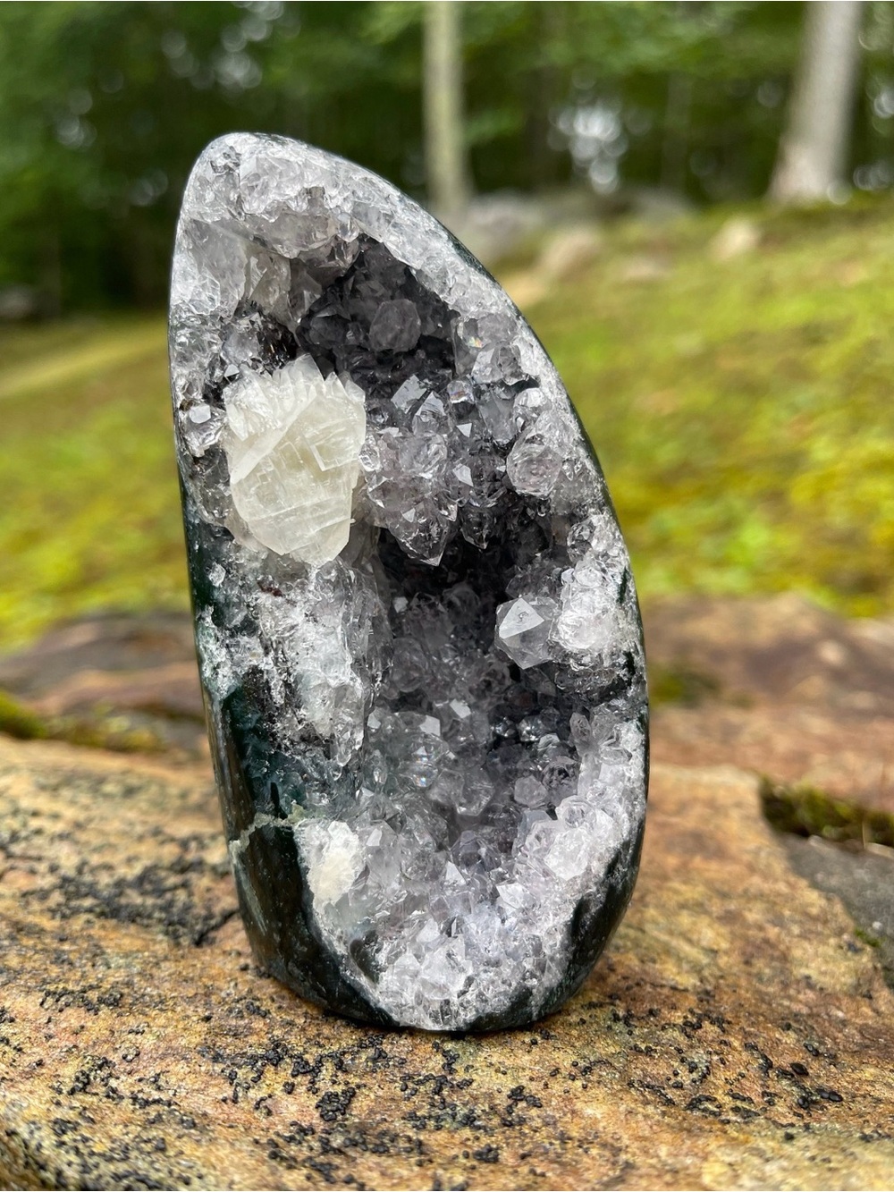 Natural amethyst cut base with calcite and polished back
